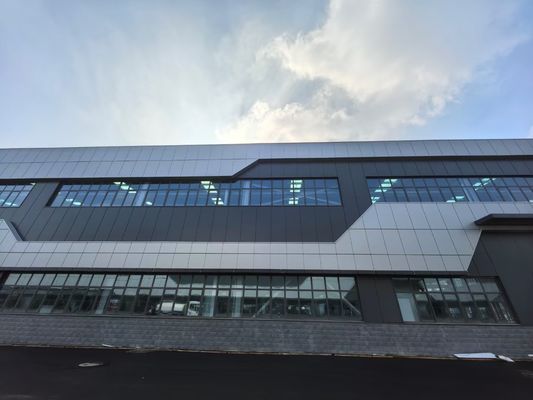 पर्यावरण के अनुकूल और निर्माण समाधानों के साथ औद्योगिक के लिए कठोर फ्रेम डिजाइन इस्पात संरचना गोदाम